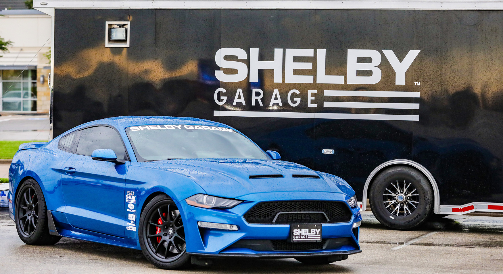 Shelby Garage feature car next to trailer